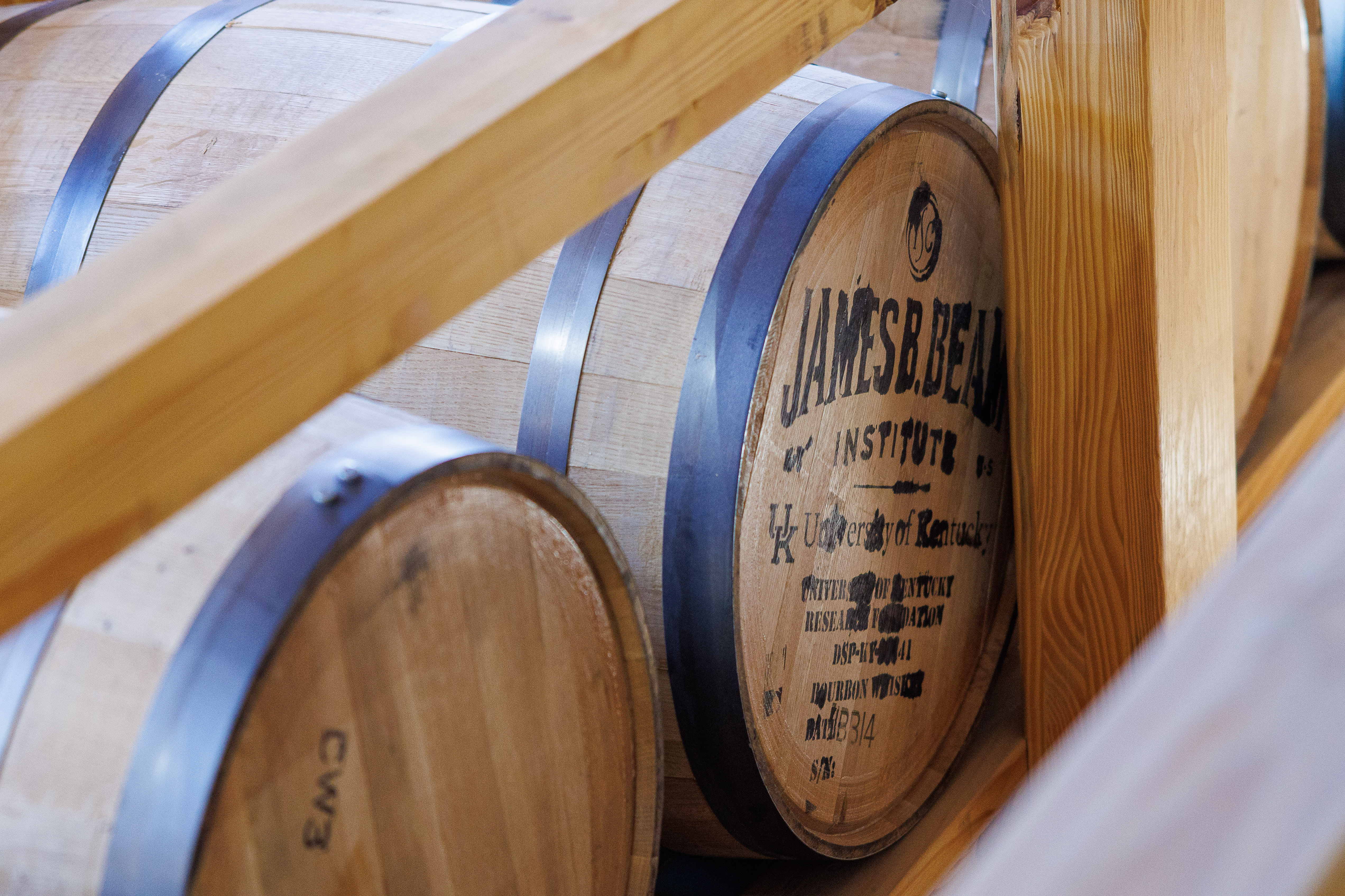 bourbon barrels with beam institute money stamp